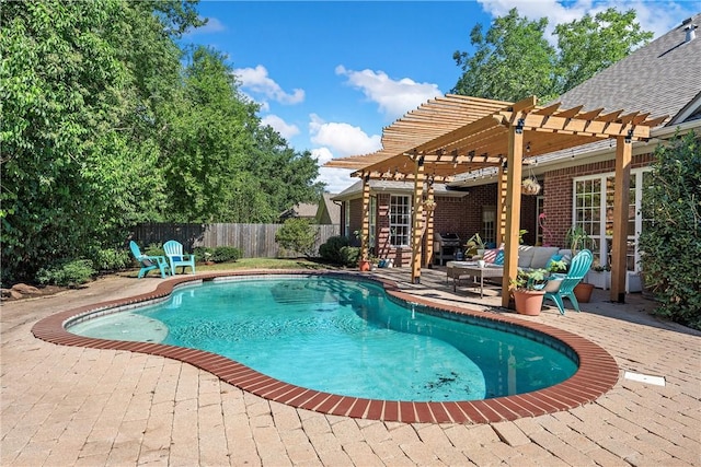 view of swimming pool with a pergola and a patio area