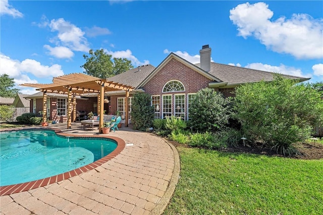 view of swimming pool featuring a pergola and a patio