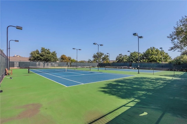 view of sport court featuring basketball hoop