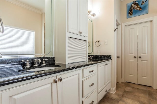 bathroom with vanity, tile patterned floors, and crown molding