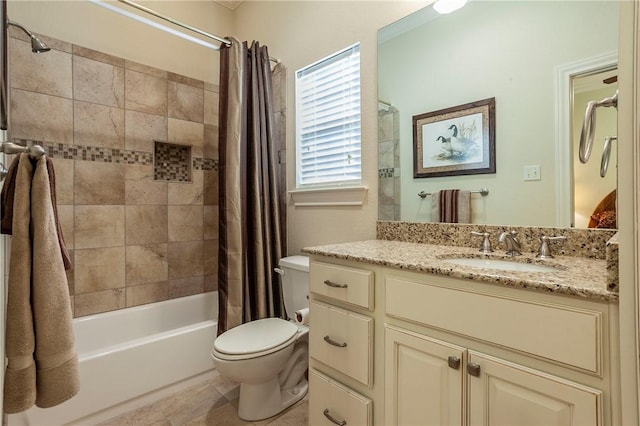 full bathroom with tile patterned flooring, shower / bath combo, toilet, and vanity