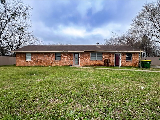 single story home with a front yard