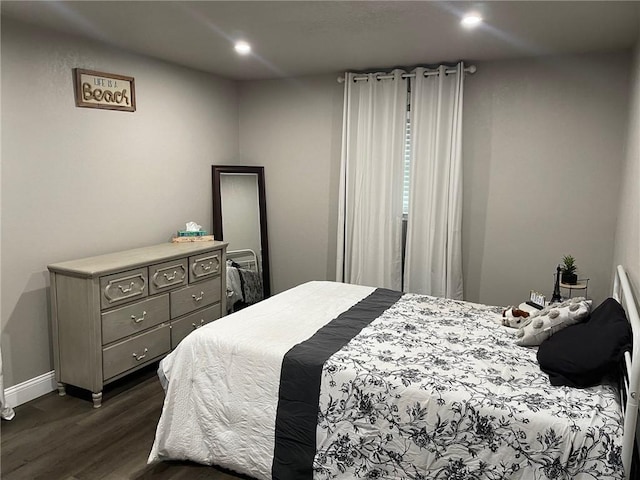 bedroom featuring dark hardwood / wood-style floors