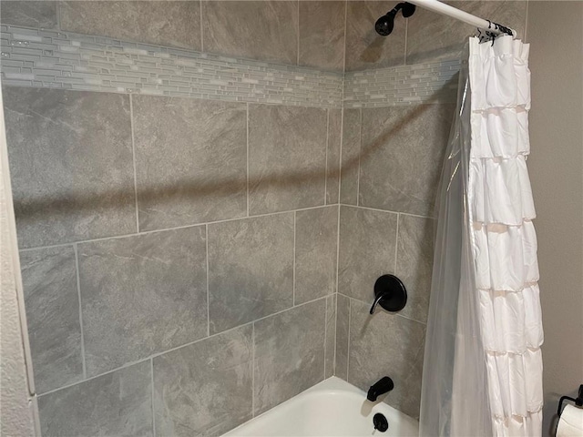 bathroom featuring shower / bath combination with curtain