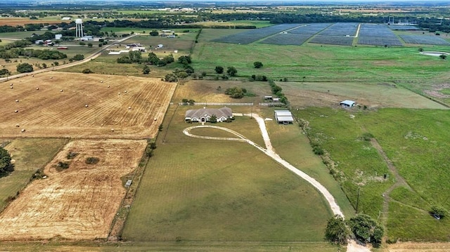 birds eye view of property featuring a rural view