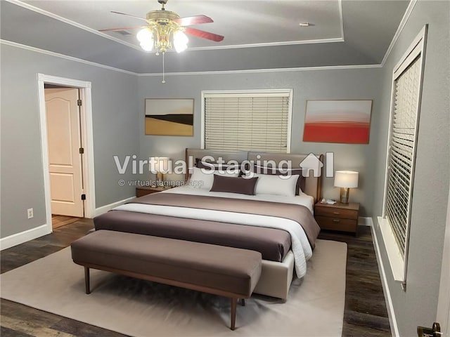 bedroom featuring dark wood-style floors, baseboards, and crown molding