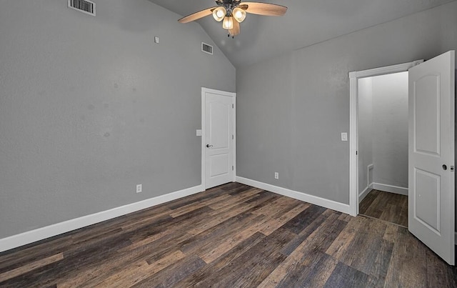 unfurnished bedroom featuring ceiling fan, dark hardwood / wood-style flooring, and high vaulted ceiling