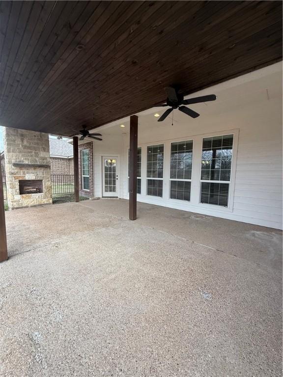 view of patio featuring ceiling fan