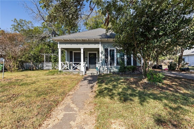 view of front of property with a front lawn and a porch