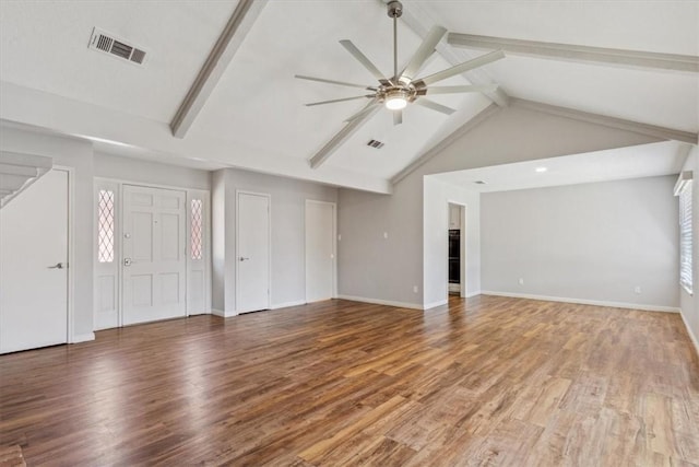 unfurnished living room featuring visible vents, baseboards, ceiling fan, beamed ceiling, and wood finished floors