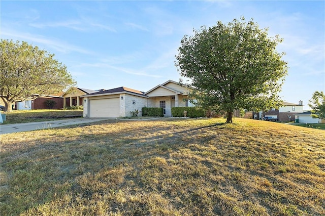 ranch-style house featuring a front lawn and a garage