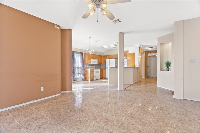 unfurnished room with ceiling fan with notable chandelier