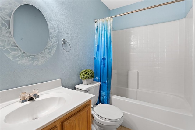 full bathroom with vanity, toilet, and shower / tub combo