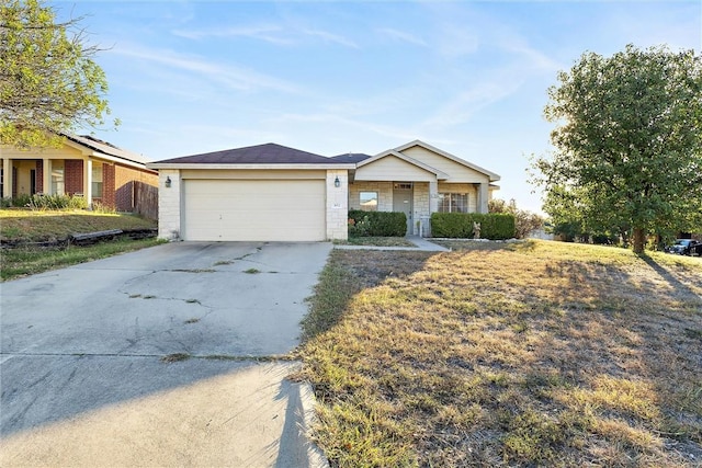 ranch-style house with a porch, a garage, and a front lawn