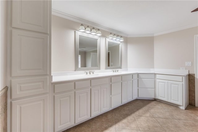 bathroom with vanity, tile patterned floors, and crown molding