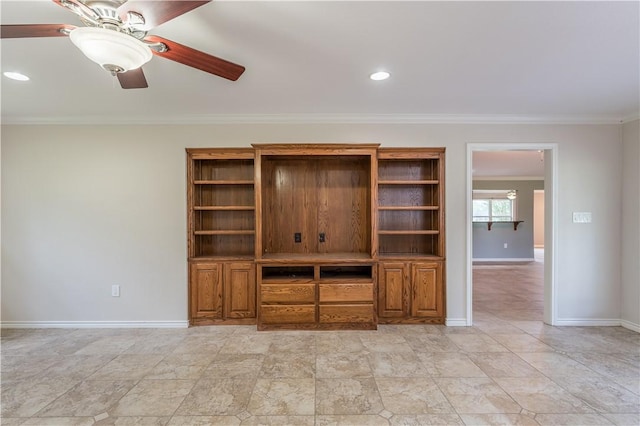 unfurnished living room with ceiling fan and ornamental molding