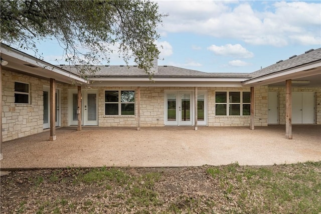 back of property featuring french doors