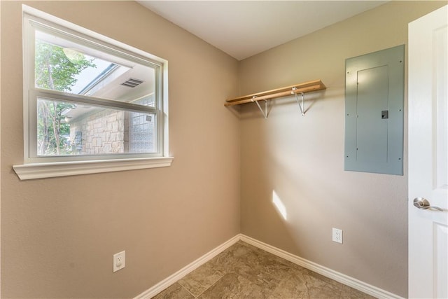 walk in closet featuring electric panel