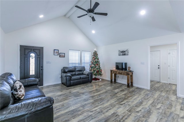 living room with wood-type flooring, high vaulted ceiling, ceiling fan, and beam ceiling