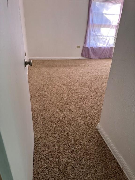 empty room with carpet floors