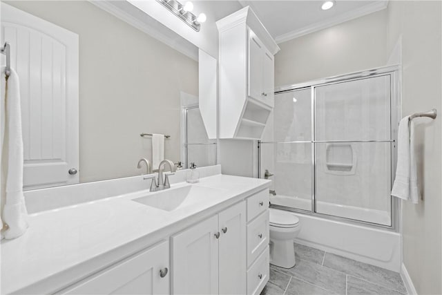 full bathroom with vanity, crown molding, enclosed tub / shower combo, tile patterned flooring, and toilet