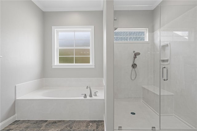 bathroom featuring separate shower and tub