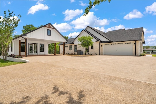 modern farmhouse style home featuring a garage