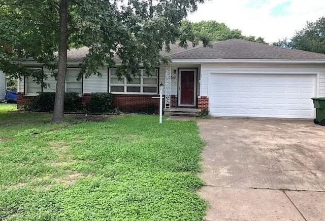 single story home with a front yard and a garage