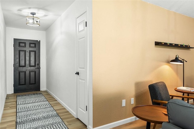 foyer with light wood-type flooring