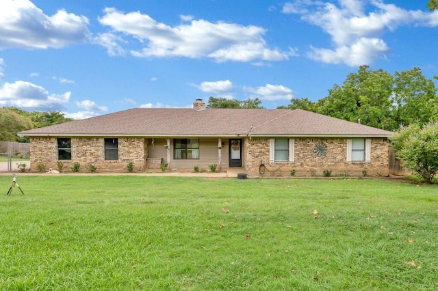 ranch-style house with a front yard