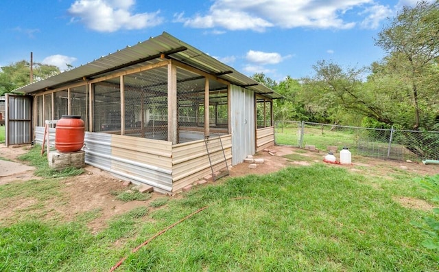 exterior space with an outbuilding