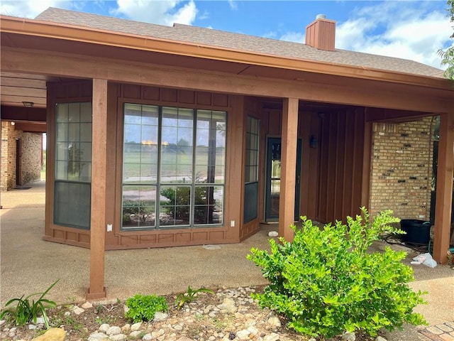 doorway to property featuring a patio