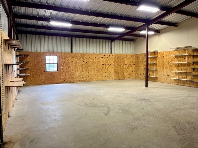 garage with wood walls