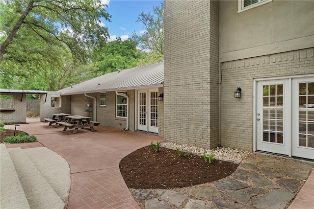 view of patio / terrace featuring french doors