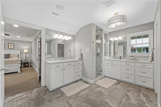 full bathroom featuring a stall shower, baseboards, and visible vents