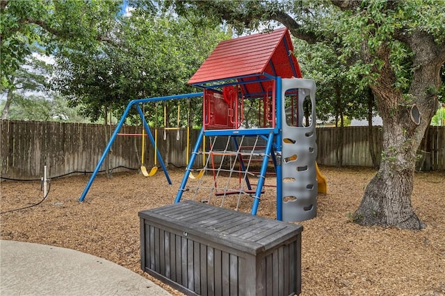 view of play area with a fenced backyard