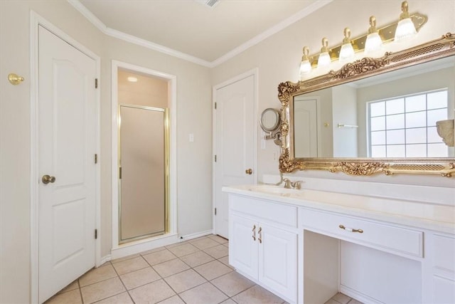 bathroom featuring a stall shower, tile patterned flooring, ornamental molding, and vanity