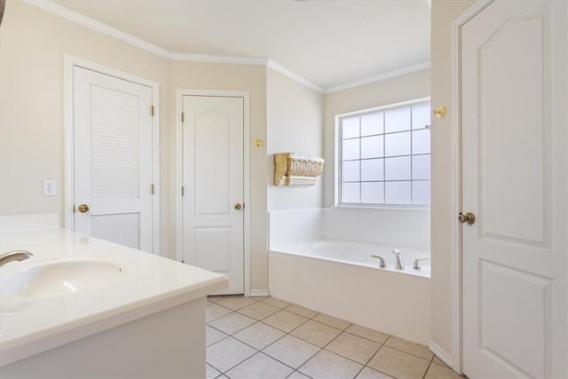 bathroom featuring crown molding, a closet, vanity, a bath, and tile patterned floors