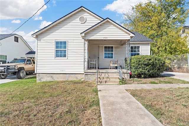 bungalow-style house featuring a front yard and a porch