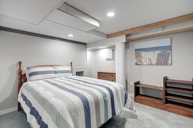 bedroom featuring concrete flooring