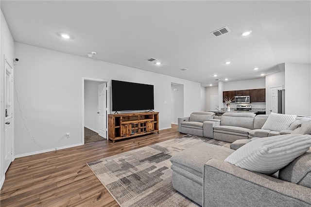 living room with hardwood / wood-style floors