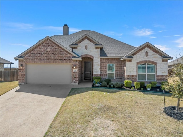 french provincial home featuring driveway, brick siding, roof with shingles, and an attached garage