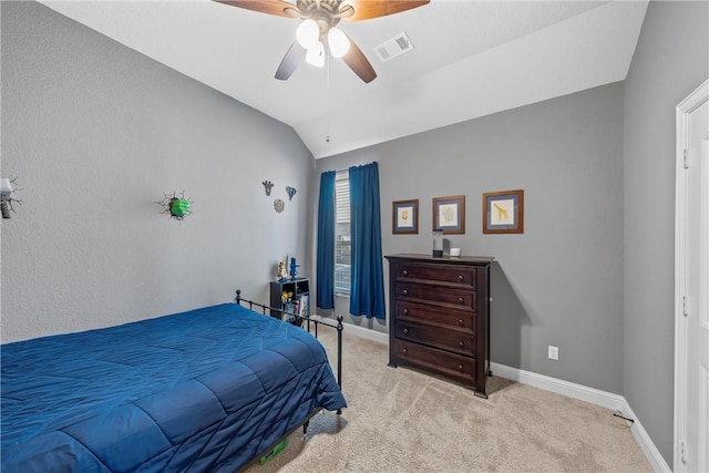 bedroom with visible vents, baseboards, carpet flooring, lofted ceiling, and ceiling fan