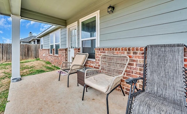 view of patio / terrace with fence