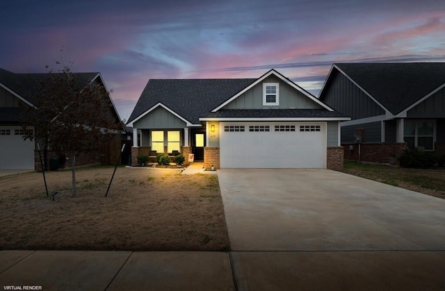 craftsman inspired home with board and batten siding, concrete driveway, and brick siding