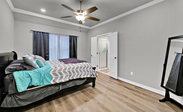 bedroom featuring baseboards, ceiling fan, ornamental molding, and light wood-style floors