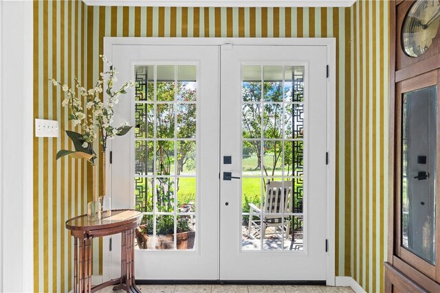 entryway with french doors and a healthy amount of sunlight