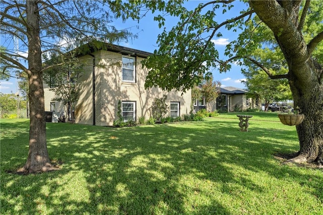 exterior space with a lawn