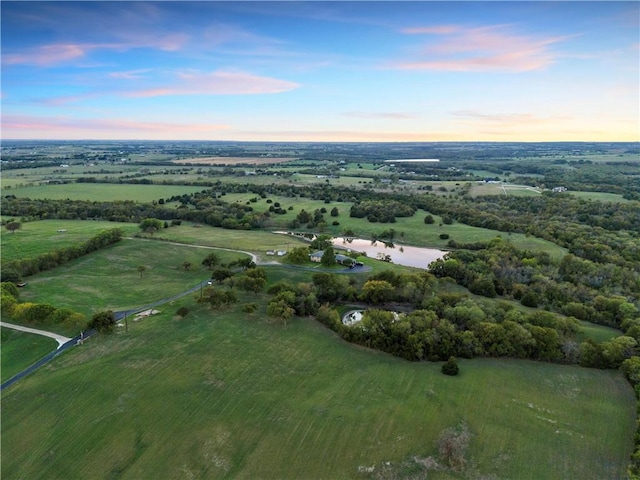 aerial view at dusk with a rural view