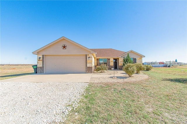 single story home with a front lawn and a garage